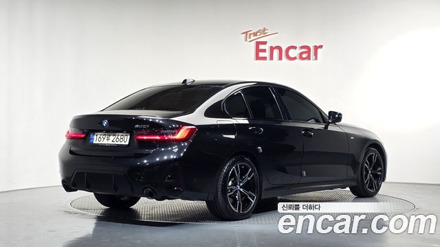 BMW 3-Series 2024 — photo 2