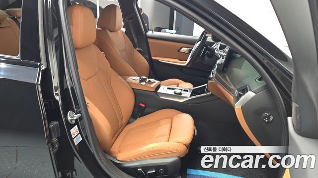 BMW 3-Series 2024 — photo 16