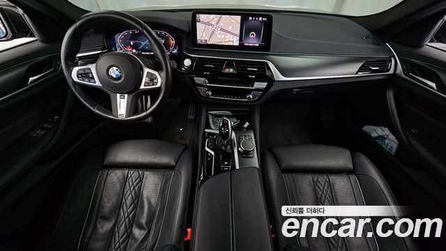 BMW 5-Series 2023 — photo 10