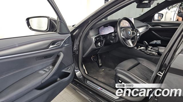 BMW 5-Series 2023 — photo 13