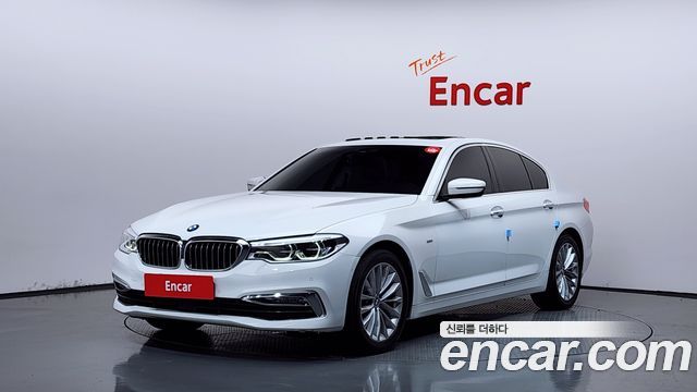 BMW 5-Series 2018 — photo 1
