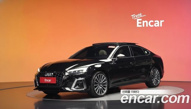 Audi A5 2023 — photo 1