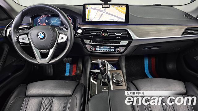 BMW 5-Series 2023 — photo 10
