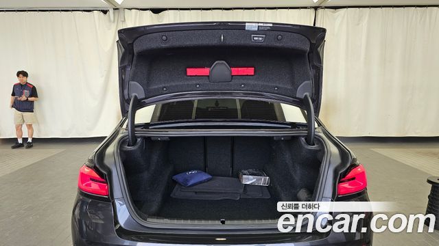 BMW 5-Series 2023 — photo 26