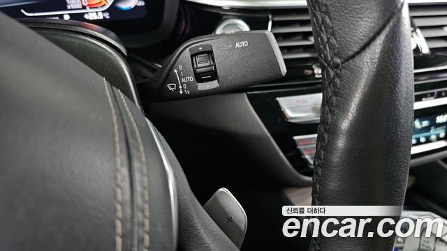 BMW 5-Series 2023 — photo 28