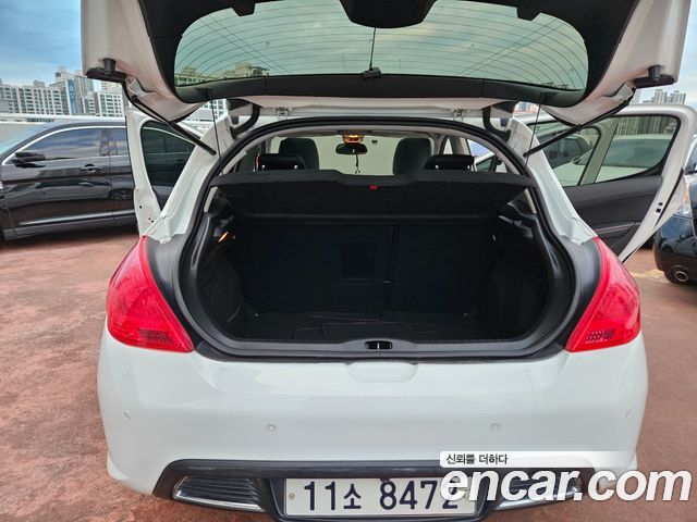 Peugeot 308 2014 — photo 16