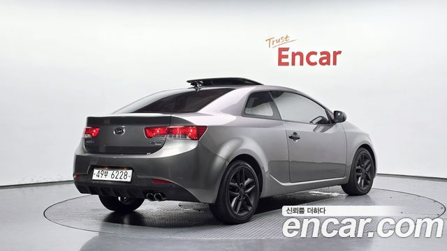 Kia Porte 2011 — photo 2