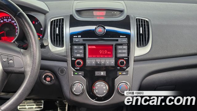 Kia Porte 2011 — photo 24