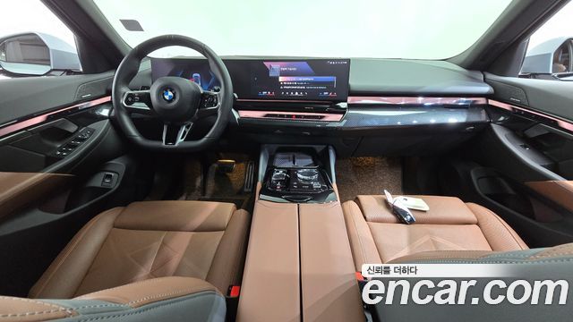 BMW 5-Series 2024 — photo 10