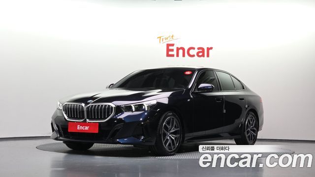 BMW 5-Series 2024 — photo 1