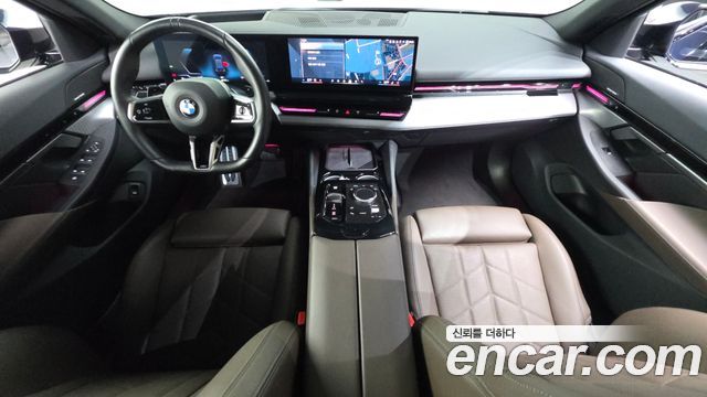 BMW 5-Series 2024 — photo 10
