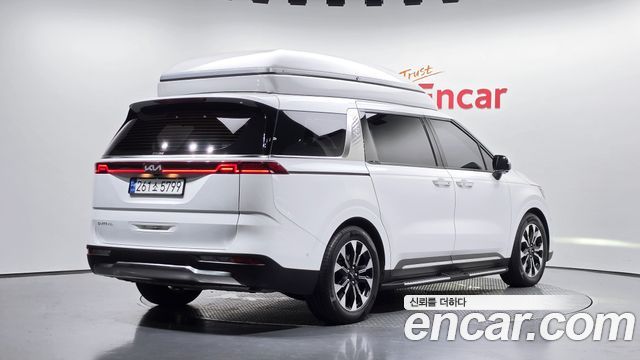 Kia Canival 2023 — photo 2