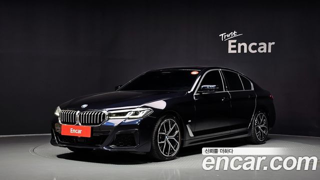 BMW 5-Series 2022 — photo 1