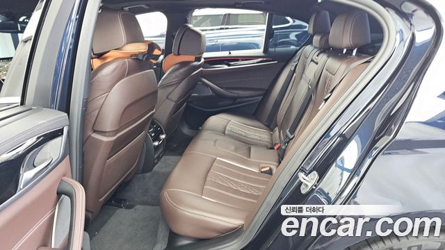 BMW 5-Series 2022 — photo 16