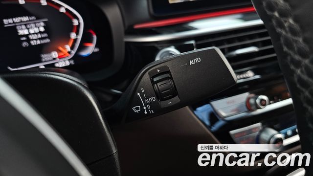 BMW 5-Series 2022 — photo 28