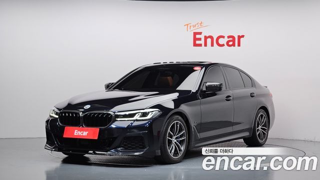 BMW 5-Series 2022 — photo 1