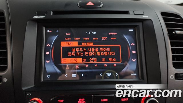 Kia K3 2015 — photo 21