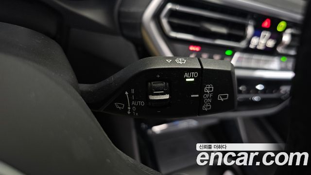 BMW iX3 2024 — photo 25