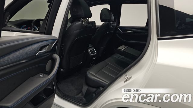 BMW iX3 2024 — photo 16