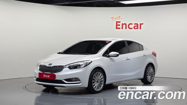 Kia K3 2013 — photo 1