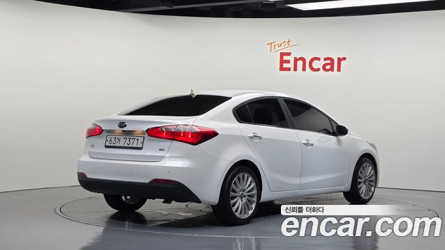 Kia K3 2013 — photo 2