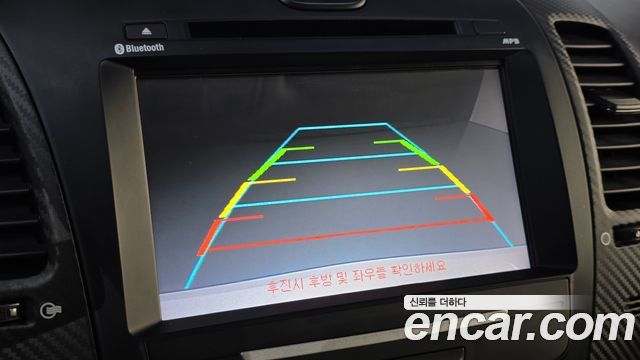 Kia K3 2013 — photo 15