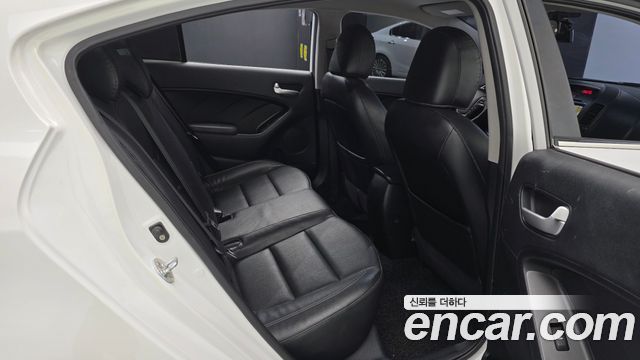 Kia K3 2013 — photo 18
