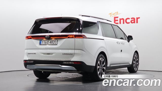 Kia Canival 2021 — photo 2