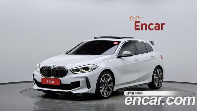 BMW 1-Series 2021 — photo 1
