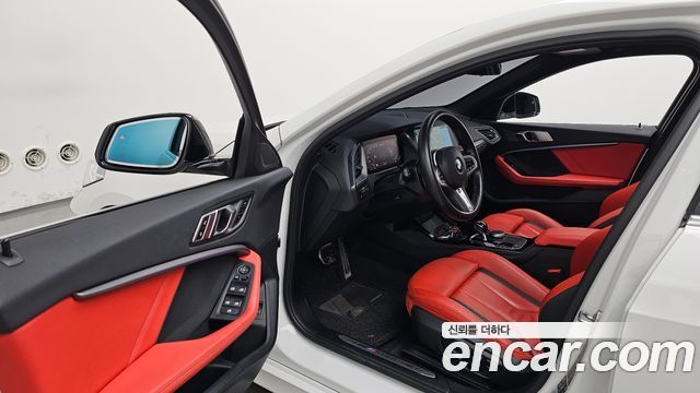 BMW 1-Series 2021 — photo 13