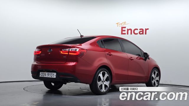Kia pride 2012 — photo 2