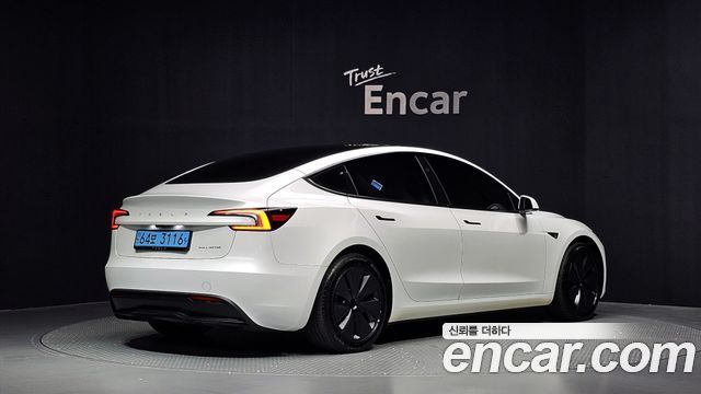 Tesla Model 3 2024 — photo 2