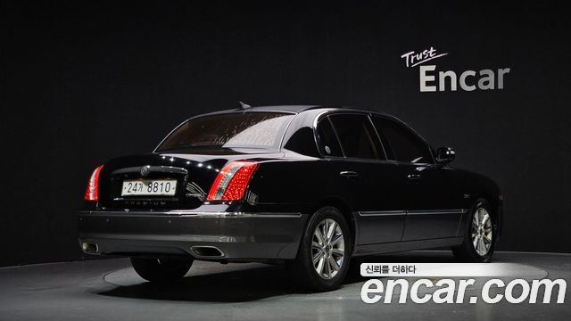 Kia OPIRUS 2010 — photo 2