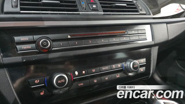 BMW 5-Series 2014 — photo 24
