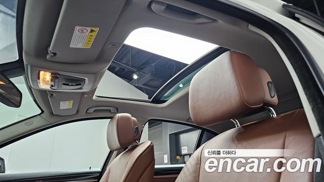 BMW 5-Series 2013 — photo 19