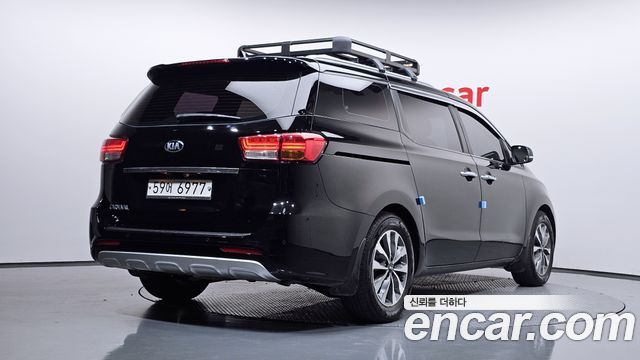 Kia Canival 2015 — photo 2