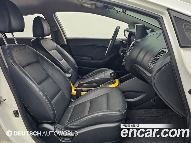 Kia K3 2014 — photo 10