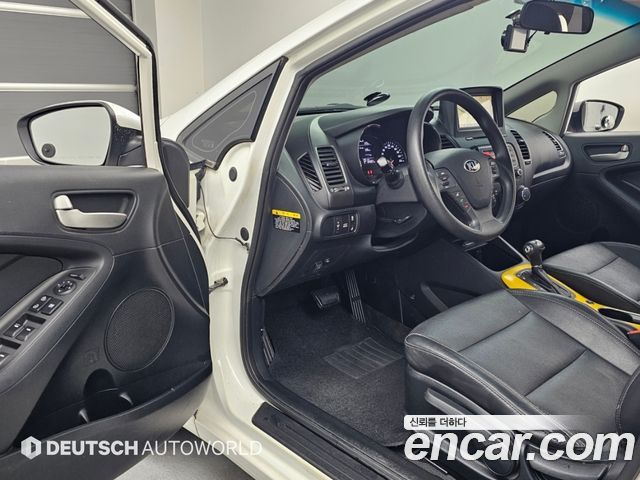Kia K3 2014 — photo 11