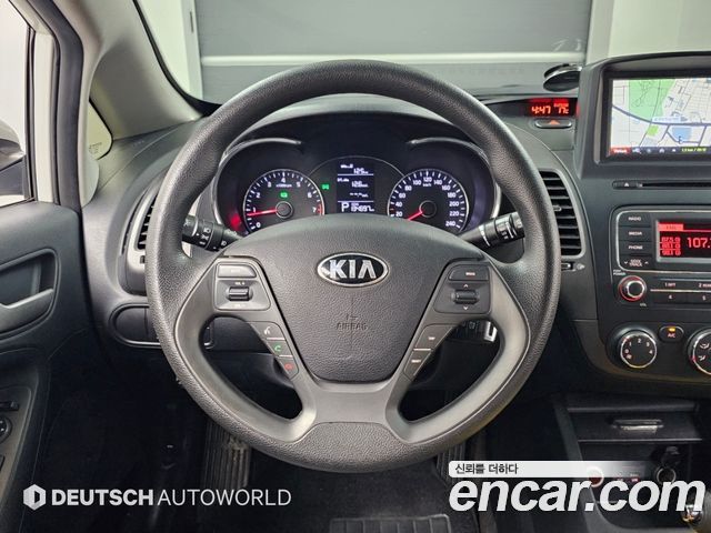 Kia K3 2014 — photo 13