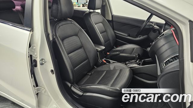 Kia K3 2016 — photo 18