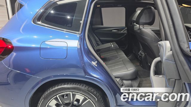 BMW iX3 2023 — photo 17