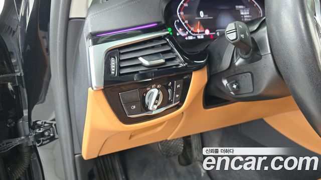 BMW 5-Series 2022 — photo 26