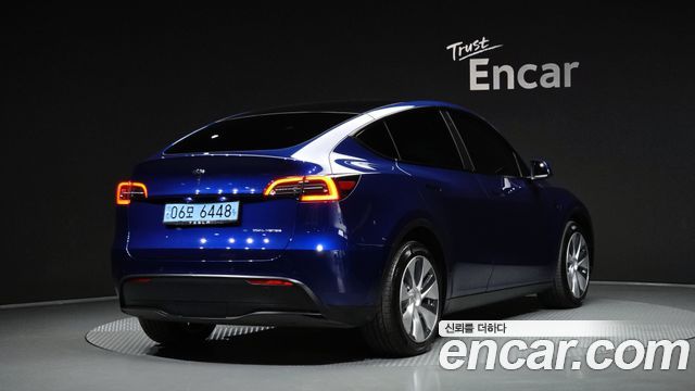 Tesla Model Y 2022 — photo 2