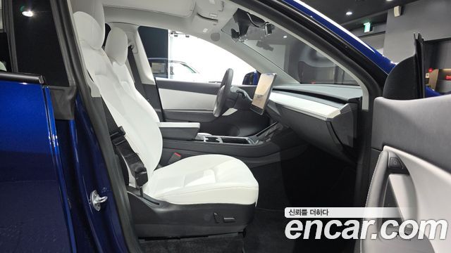 Tesla Model Y 2022 — photo 16