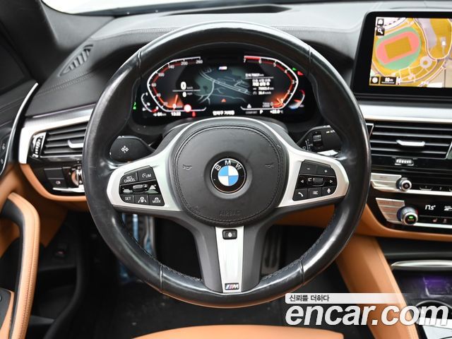 BMW 5-Series 2023 — photo 13
