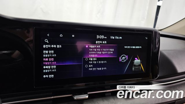 Kia Canival 2023 — photo 33
