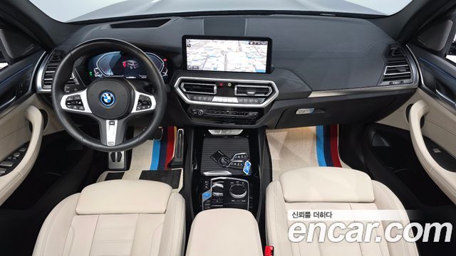 BMW iX3 2024 — photo 10