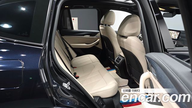 BMW iX3 2024 — photo 18