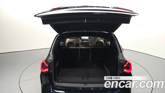 BMW iX3 2024 — photo 26