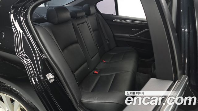 BMW 5-Series 2011 — photo 12